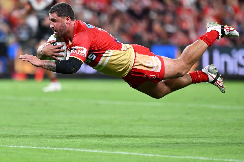 Kenny Bromwich dives in for a try.