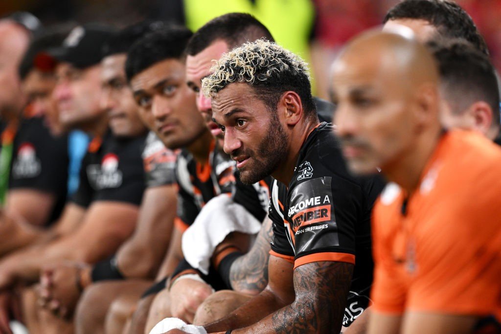 Api Koroisau sitting on the bench during an NRL game.