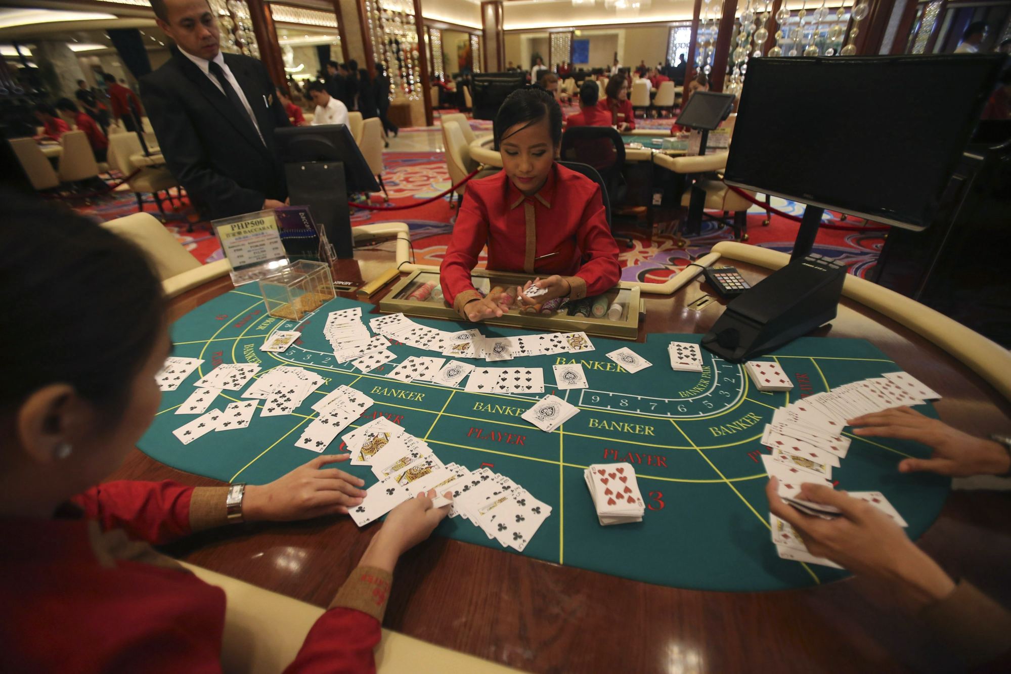 Dealers sort cards at a casino in Pasay city, Metro Manila. The Philippines’ gross gaming revenue is expected to exceed US$6 billion this year. Photo: Reuters