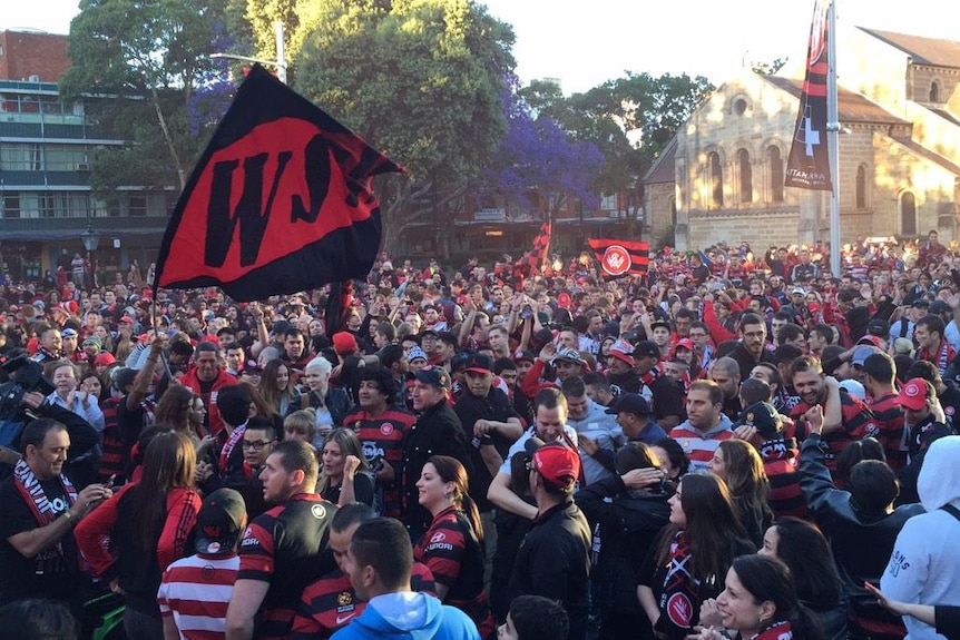 Hundreds of Western Sydney Wanderers fans in Parramatta celebrate a win