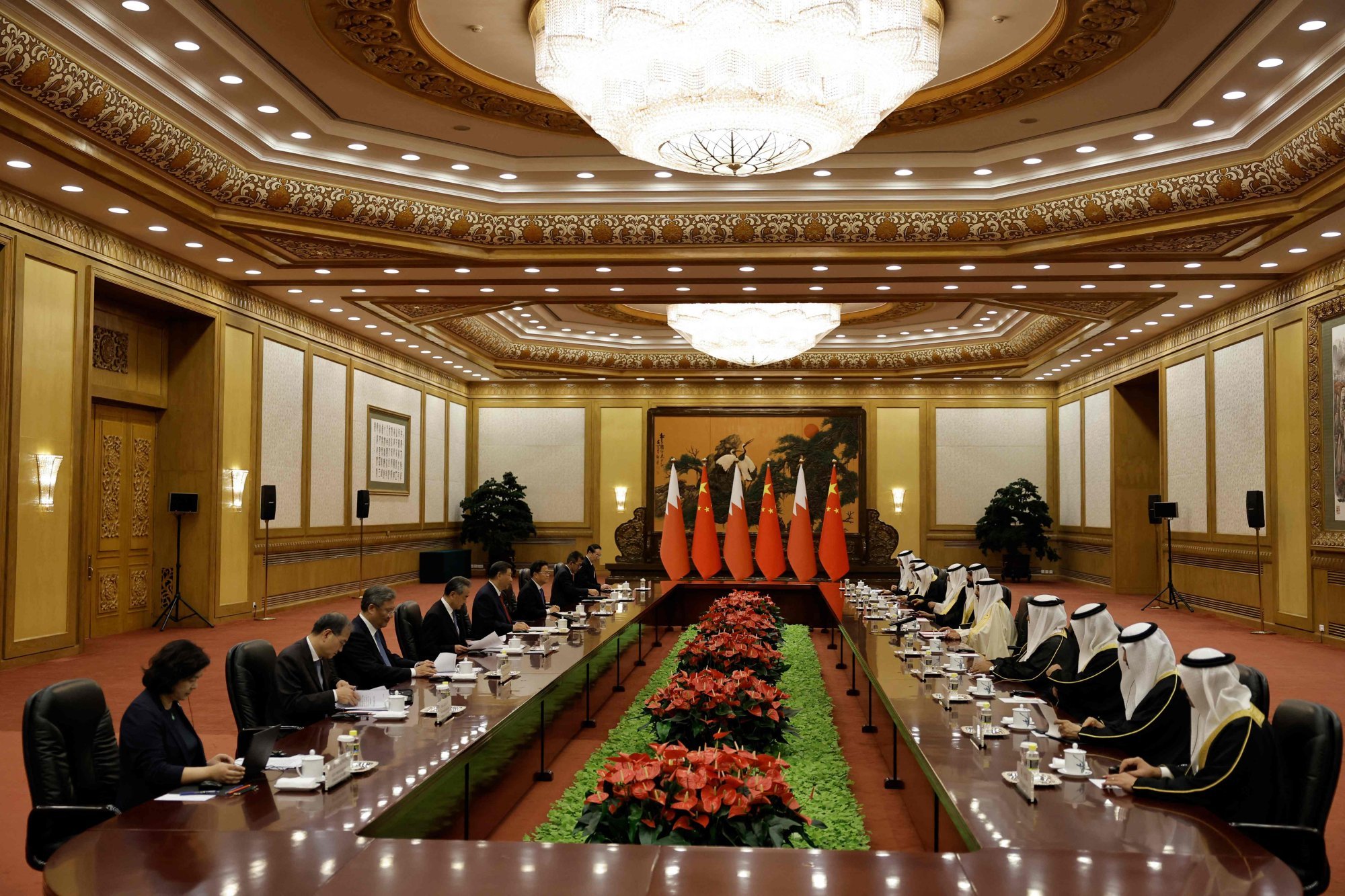A meeting between China’s Xi, Bahrain’s king and officials from both sides at the Great Hall of the People in Beijing. Photo: AFP