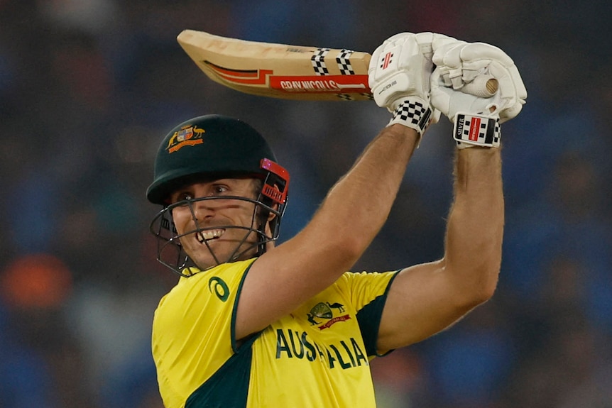 Australia cricket Mitchell Marsh folows through with a cricket shot during a World Cup final