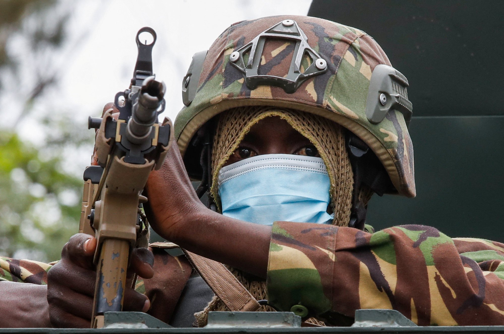 A member of the Kenya Defence Forces holds a weapon from a military vehicle as Kenya Defence Forces are deployed to curb a demonstration on Thursday. Photo: Reuters