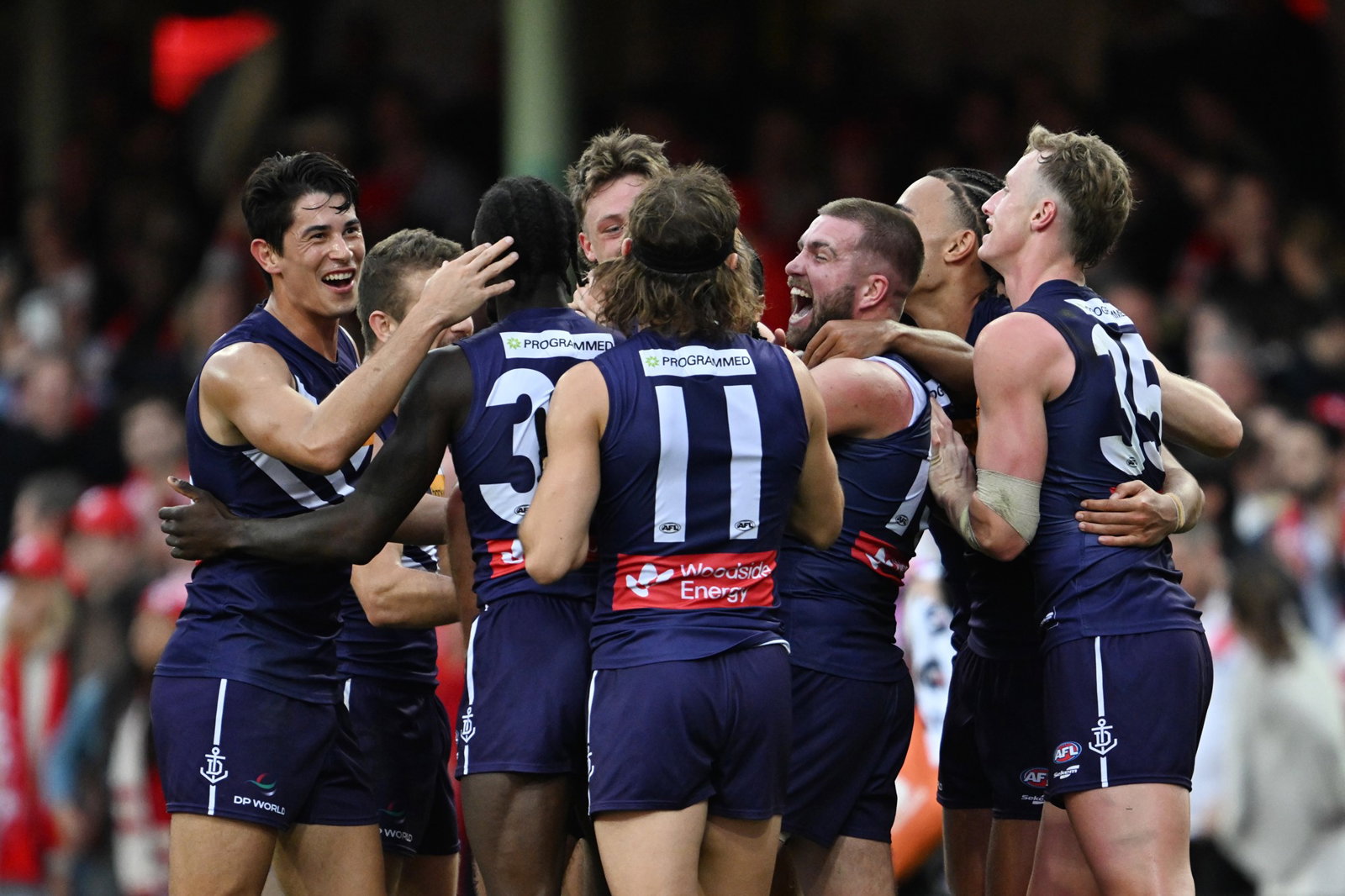 Freo players celebrate a win