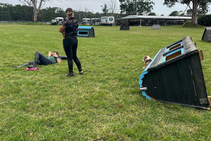 A man lies on the ground.