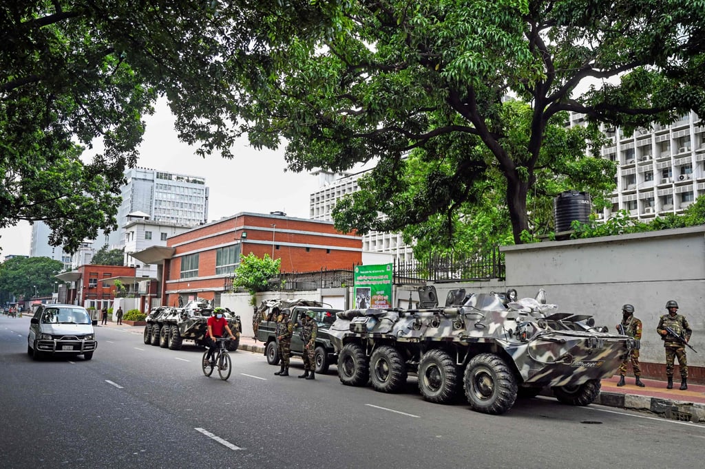 Bangladesh army stand guard near the country’s secretariat as the curfew is relaxed after the anti-quota protests. Photo: AFP