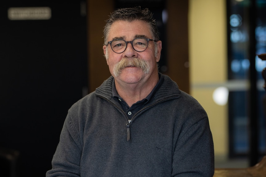 David Boon looks at the camera.