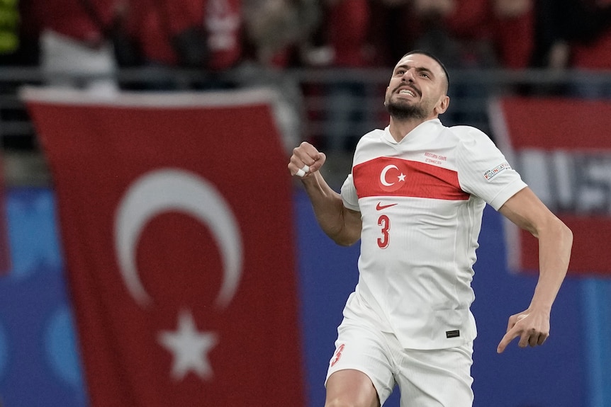 Merih Demiral celebrates