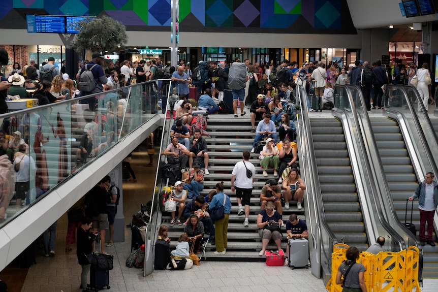 People sit on stairs 