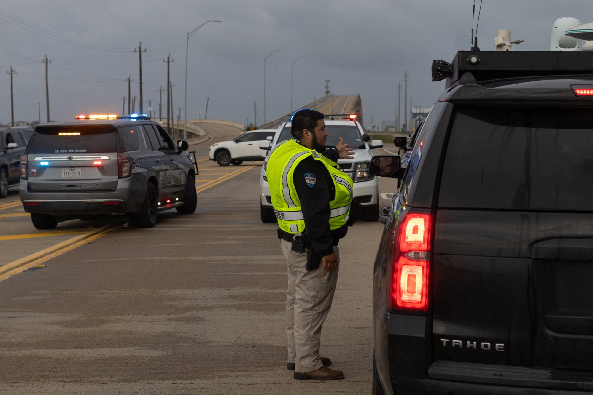 A Surfside Beach policeman directs traffic away from the city ahead of Hurricane Beryl. Photo: Reuters