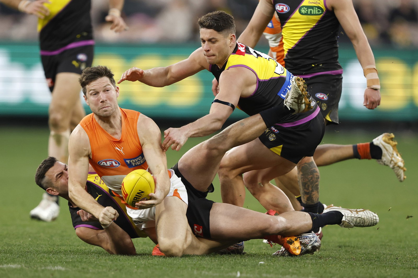 Toby Greene handballs