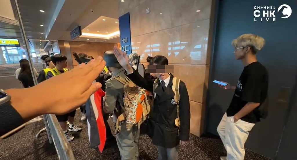 A screenshot of the live stream showing a group of cosplayers dressed as Adolf Hitler and German soldiers, who join the host in making a Nazi salute at the event. Photo: Handout
