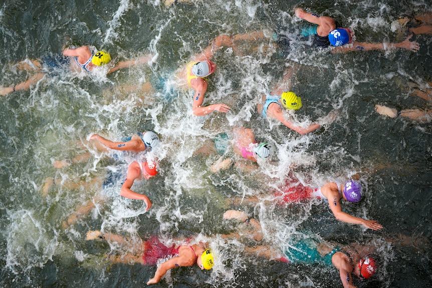 Swimmers battle for position
