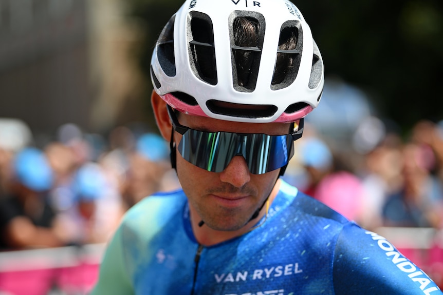 Ben O'Connor looks serious wearing sunglasses
