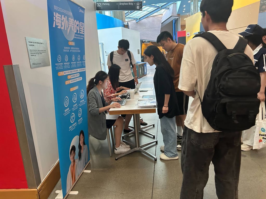 University students attend a recruitment fair hosted by Chinese consumer-electronics brand Midea at the Massachusetts Institute of Technology in Boston in July. Photo: SCMP
