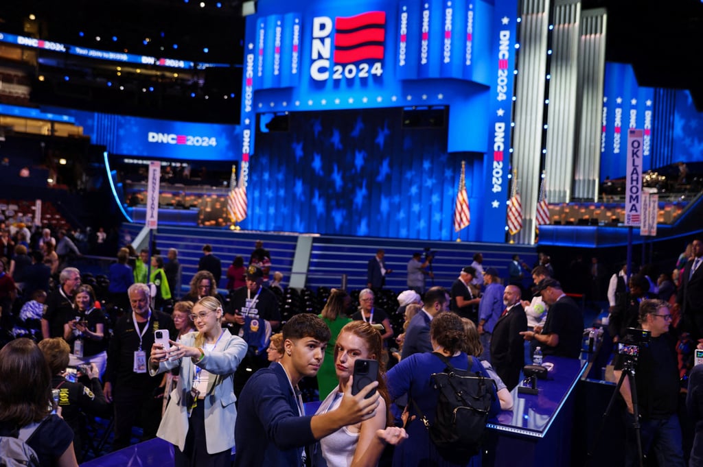 Influencers pose near the social media area at the Democratic National Convention (DNC) at the United Center, in Chicago. Photo: Reuters