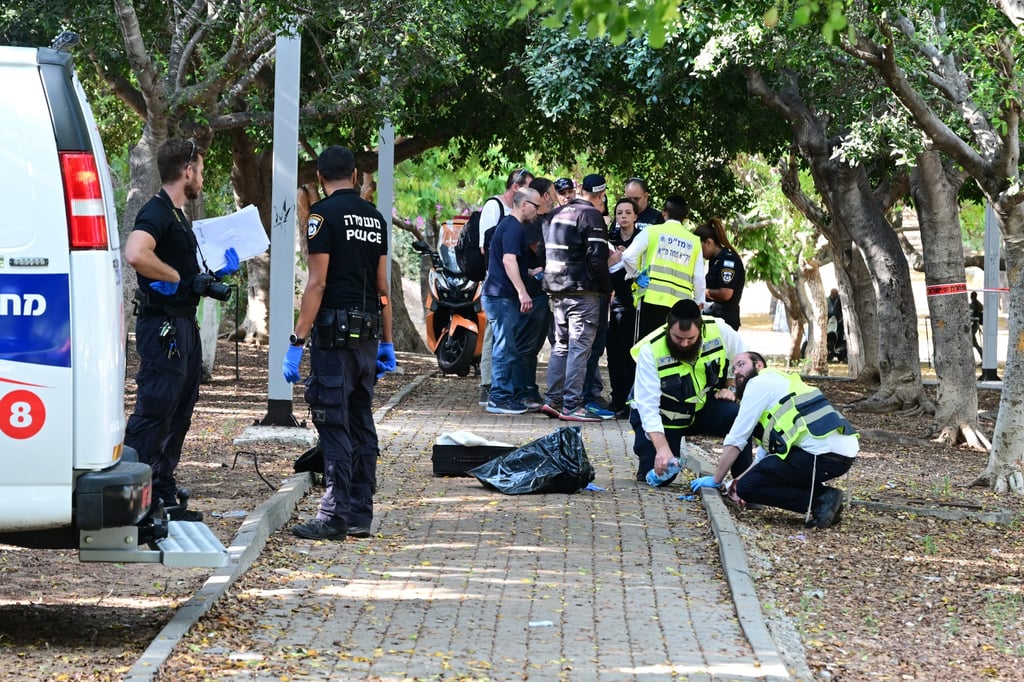 Police work at the site following a stabbing attack in Holon, Israel on Sunday. A Palestinian knifeman killed an elderly woman and a man and injured two others in central Israel on Sunday morning before being shot dead by police, Israeli authorities said. Photo: Xinhua