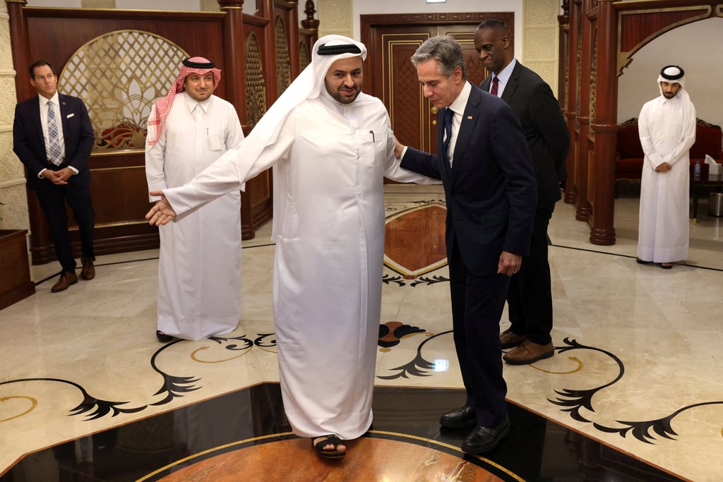 Qatari Minister of State Dr. Mohammed bin Abdulaziz Al-Khulaifi greets US Secretary of State Antony Blinken, in Doha, Qatar, on 20 August, 2024. Photo: Reuters