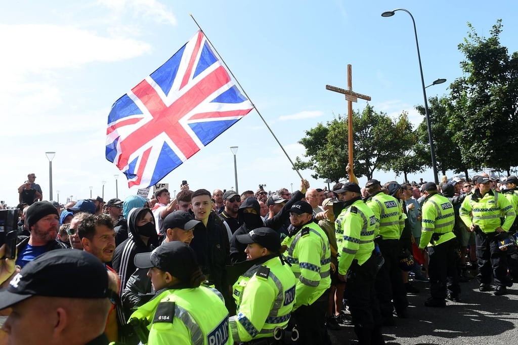 UK police have arrested more than 370 people across the country for their role in the protests as of Tuesday. Photo: AFP