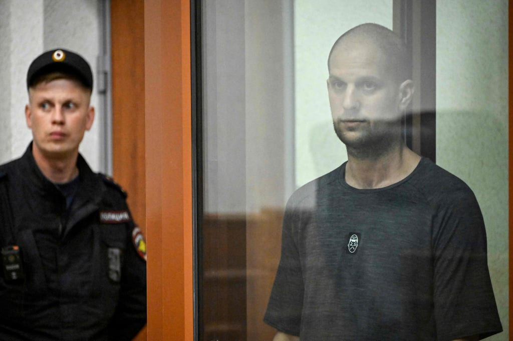 US journalist Evan Gershkovich stands inside a glass defendants’ cage during the verdict announcement in Yekaterinburg last month. Photo: AFP