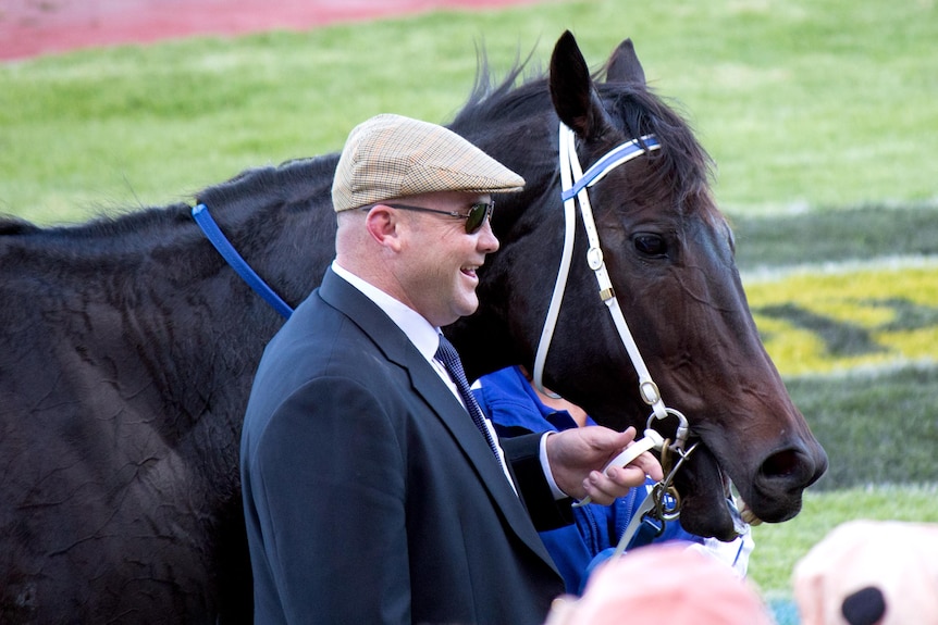 Peter Moody and Black Caviar at Morphettville in Adelaide after win number twenty.