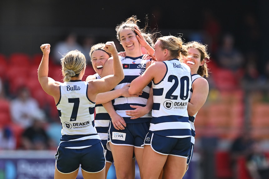 Jacqueline Parry of the Cats reacts after kicking a goal 