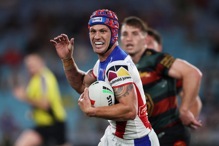 Kalyn Ponga runs with the ball