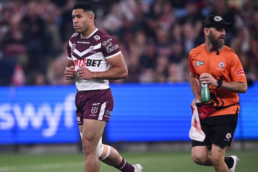 Tolutau Koula of the Sea Eagles leaves the field