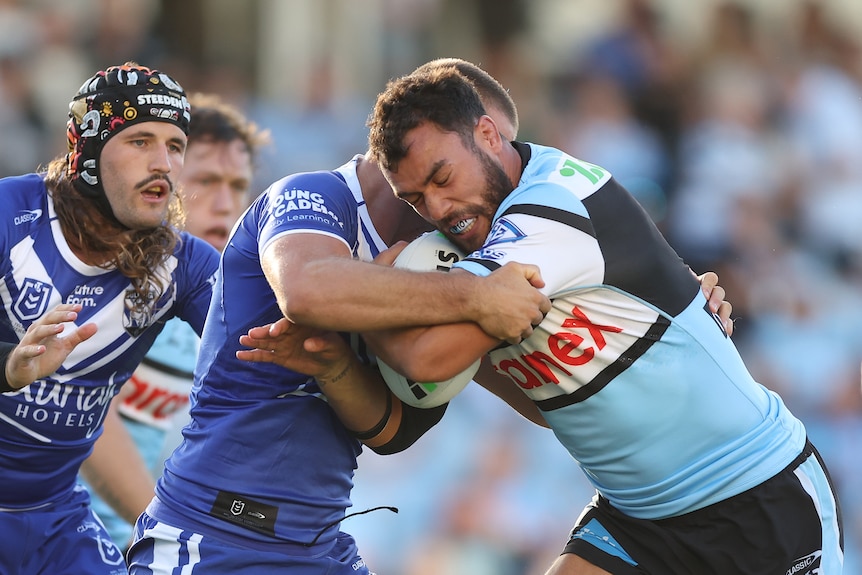 Toby Rudolph is tackled