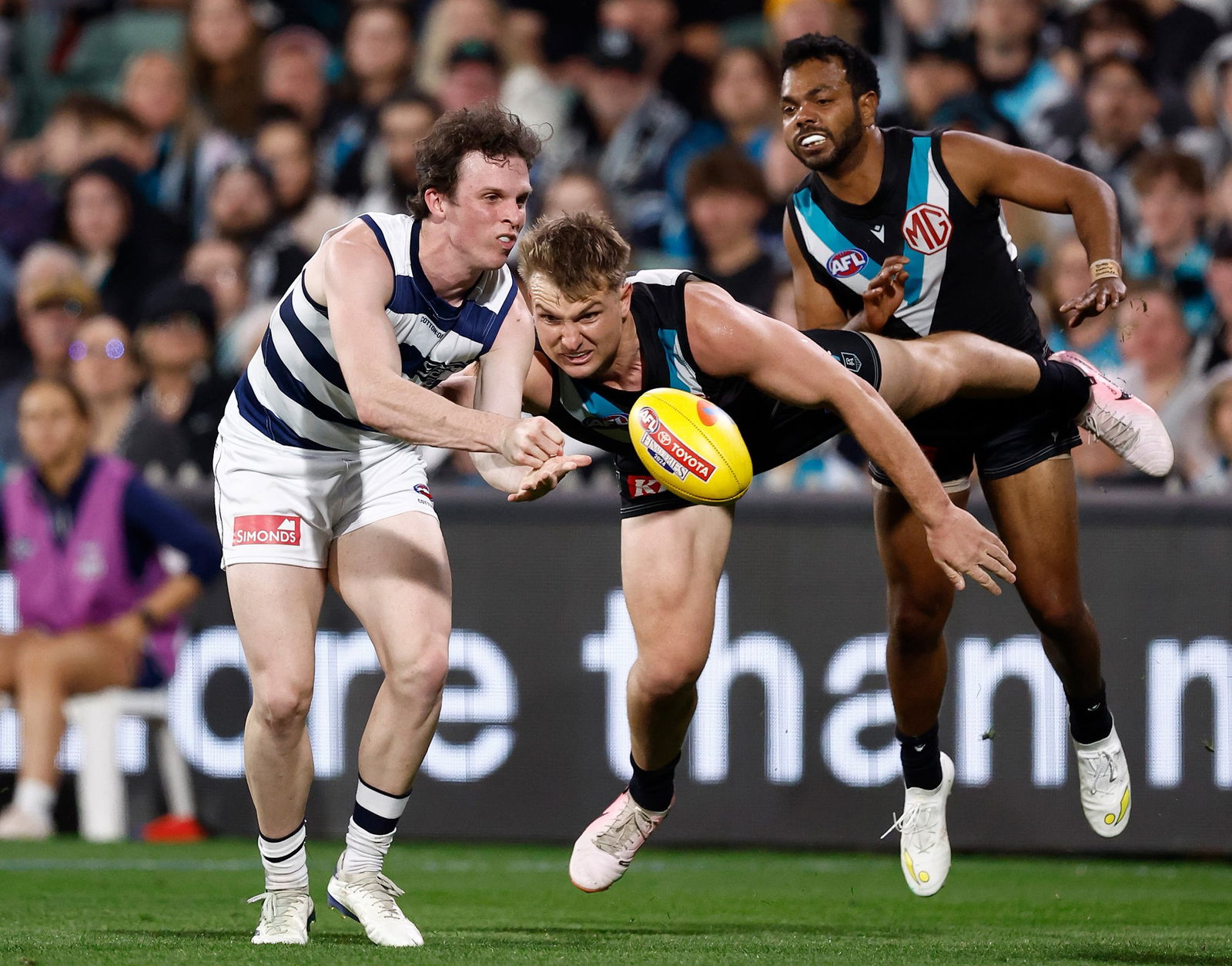 Max Holmes handballs