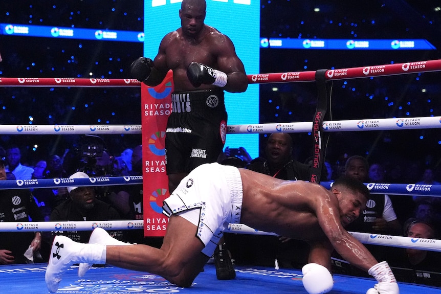 Daniel Dubois stands over Anthony Joshua