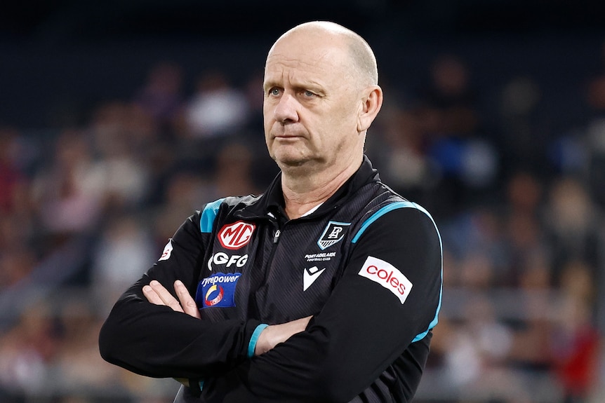 Port Adelaide coach Ken Hinkley with his arms folded.