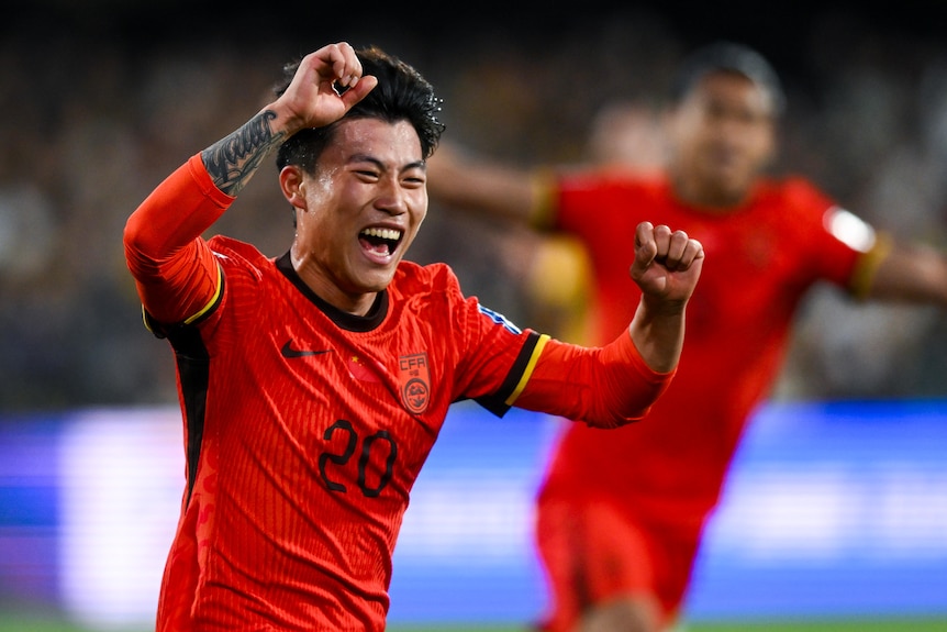Wenneng Xie celebrates