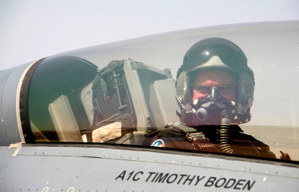 Tata Group chairman Ratan Tata sits inside the cockpit of a US military aircraft during an air show on the outskirts of Bengaluru in February 2007. Photo: Reuters