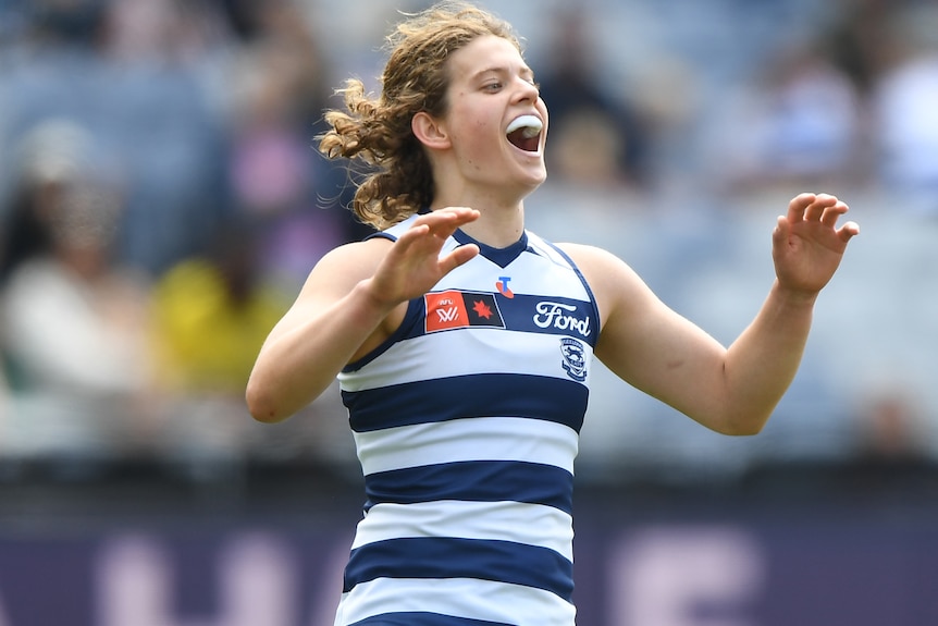 Nina Morrison reacts after kicking goal for Geelong in its AFLW match against the Brisbane Lions.