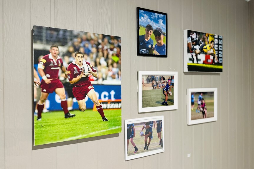 Photos on a wall in a family home.