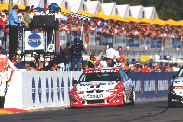 A Holden racing car on a pit strait