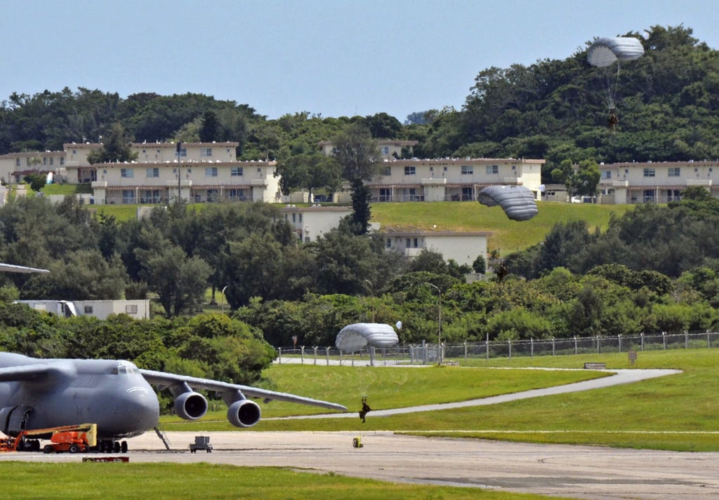 US Air Force personnel hold a parachuting drill at Kadena airbase in Okinawa on September 3. Photo: Kyodo US Air Force personnel hold a parachuting drill at Kadena airbase in Okinawa on September 3. Photo: Kyodo