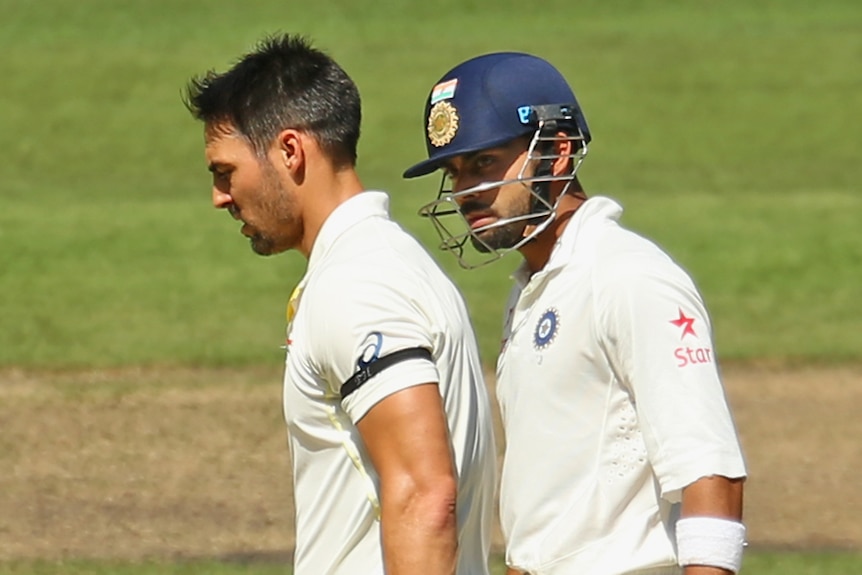 Virat Kohli talks to Mitchell Johnson