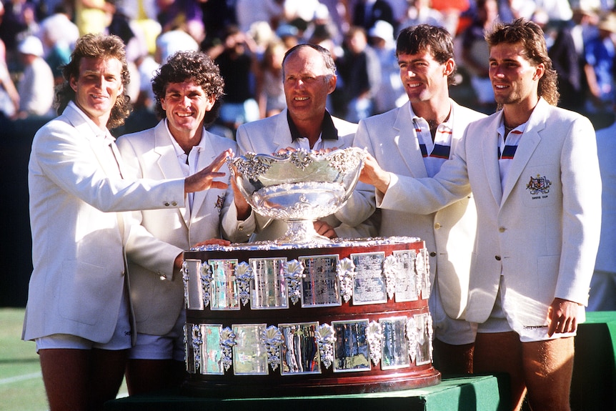 Neale Fraser (centre) with Australia's 1986 Davis Cup-winning team Peter McNamara, Paul McNamee, John Fitzgerald and Pat Cash.