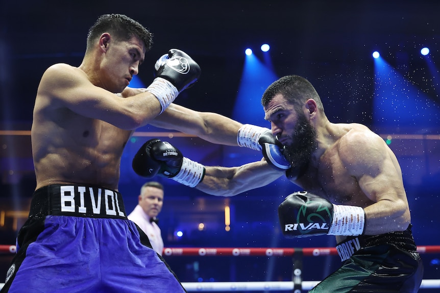 Dimitri Bivol and Artur Beterbiev fight