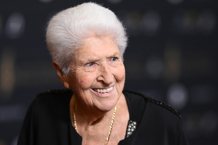 Fraser smilling on the red carpet