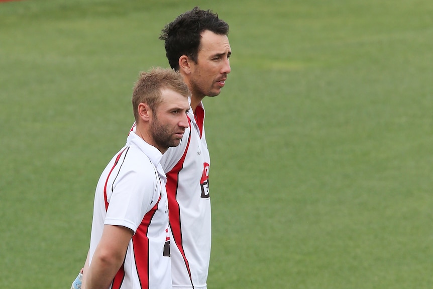Tom Cooper and Phillip Hughes at South Australia cricket training.