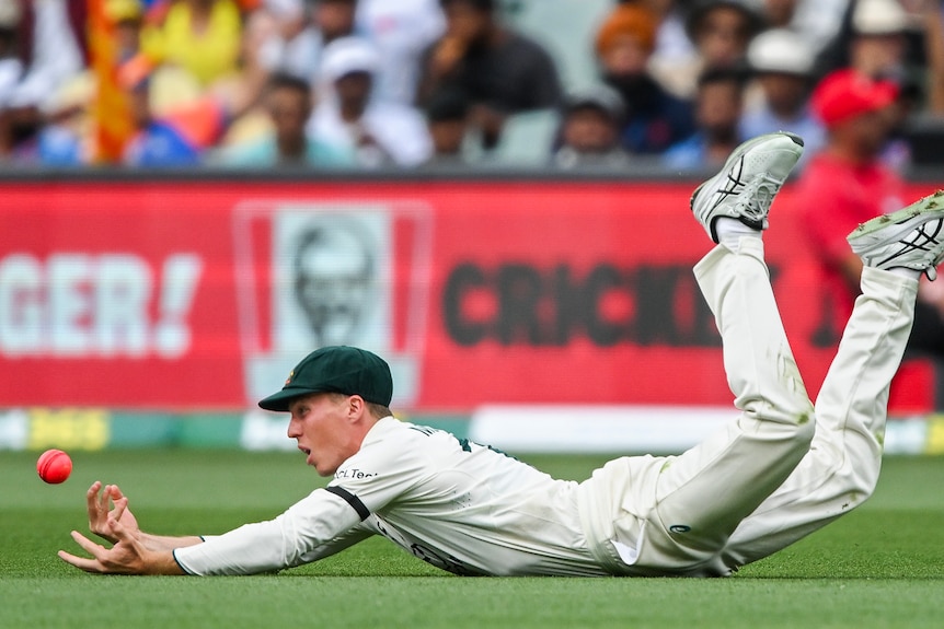 Nathan McSweeney dives on the ground