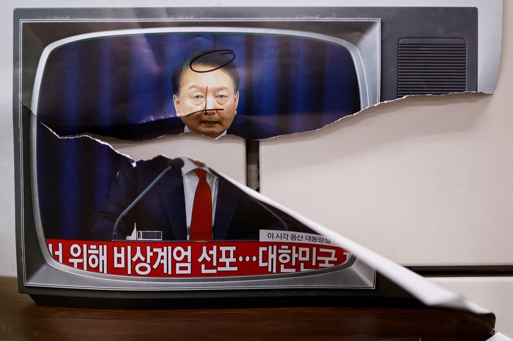 A poster featuring a defaced image of South Korean President Yoon Suk-yeol is seen in Seoul on Monday. Photo: Reuters A poster featuring a defaced image of South Korean President Yoon Suk-yeol is seen in Seoul on Monday. Photo: Reuters