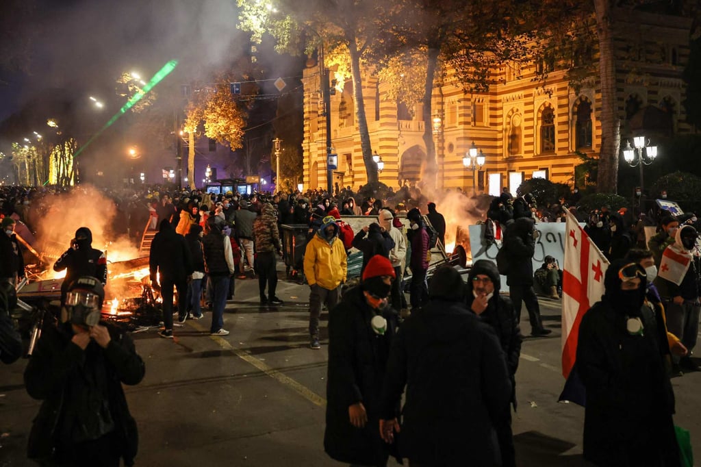 Protesters clash with police during a demonstration against the government’s decision to delay European Union membership talks amid a post-election crisis, outside the Georgia Parliament in Tbilisi. Photo?: AFP Protesters clash with police during a demonstration against the government’s decision to delay European Union membership talks amid a post-election crisis, outside the Georgia Parliament in Tbilisi. Photo?: AFP