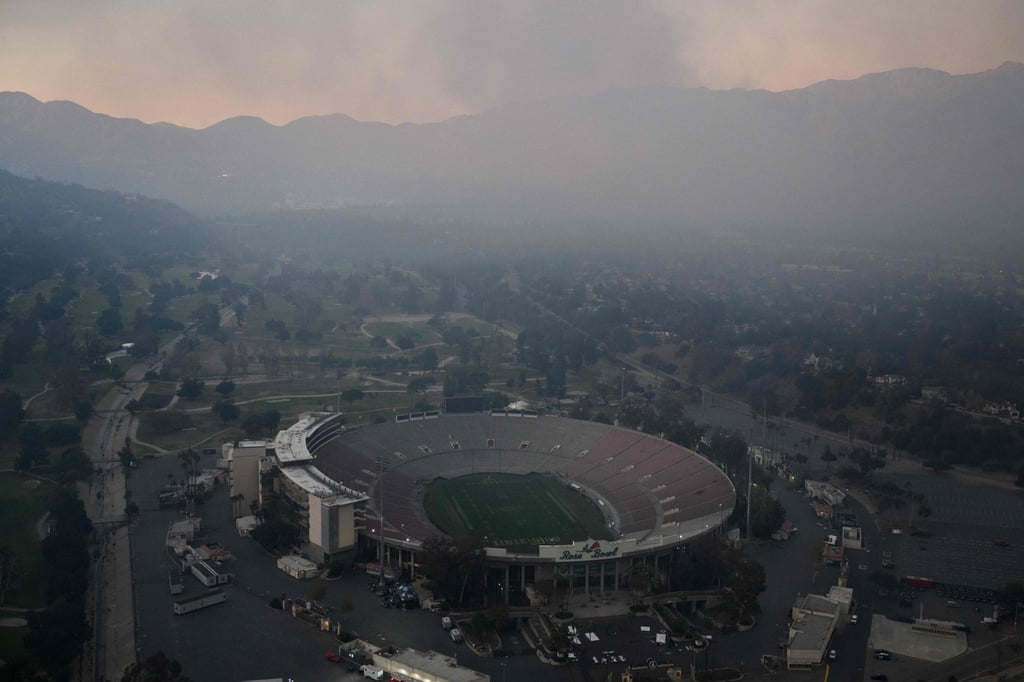 Smoke shrouds the Rose Bowl on January 8. The stadium will host football at the 2028 Games. Photo: AFP Smoke shrouds the Rose Bowl on January 8. The stadium will host football at the 2028 Games. Photo: AFP