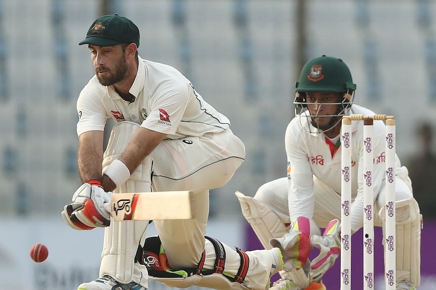 Glenn Maxwell, not wearing a helmet, plays a reverse sweep in a Test match
