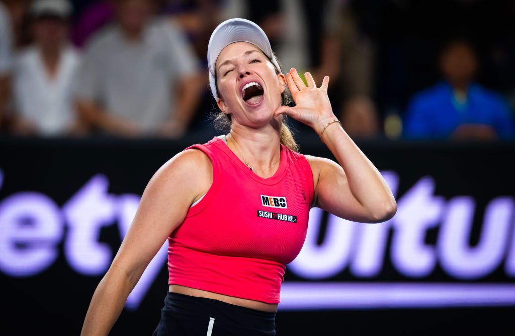 Danielle Collins gestures to the Australian Open crowd.