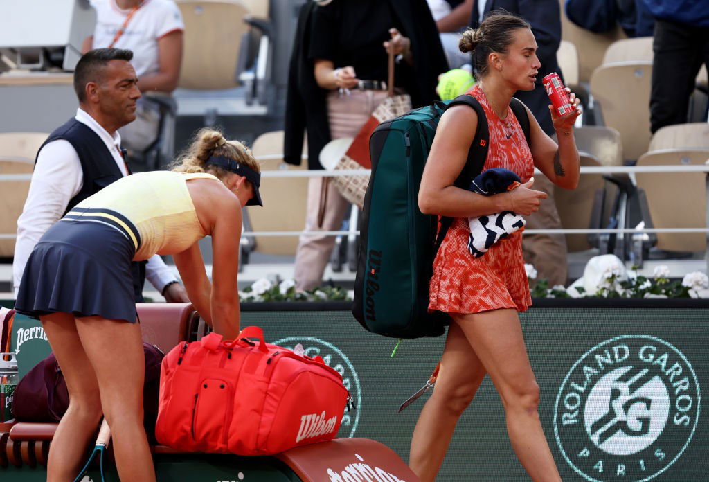 Aryna Sabalenka walks off at the French Open.